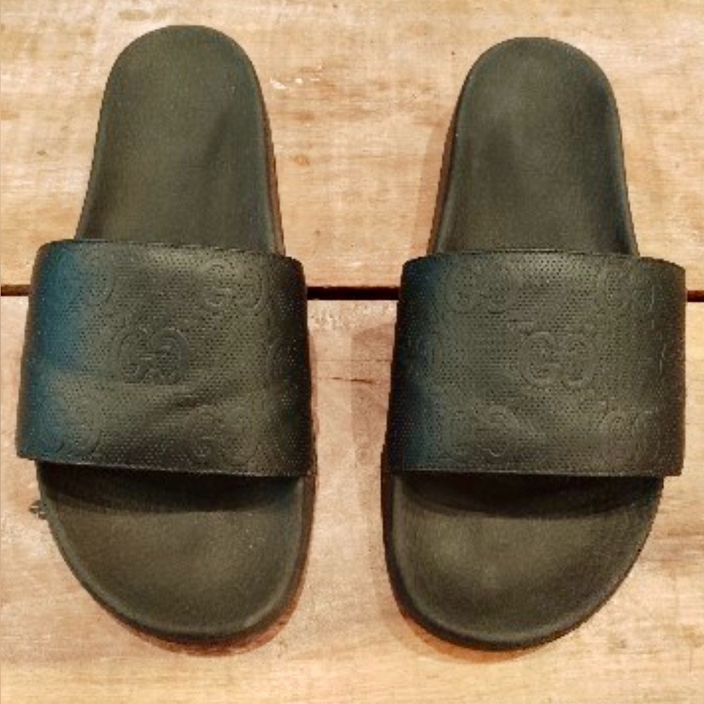 Gucci Dark black Embossed Slide Loafers